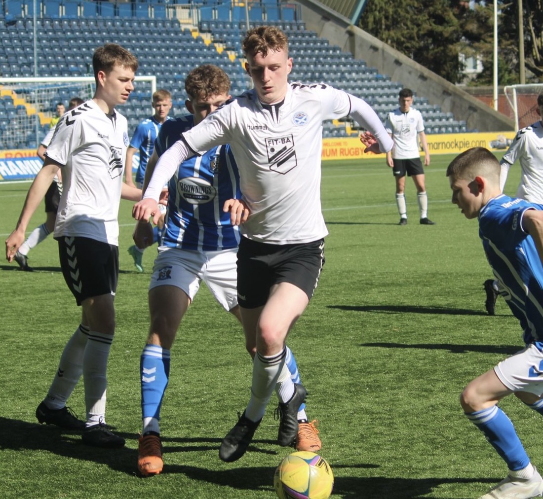 Jack Pryce on the ball at Rugby Park, Kilmarnock